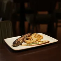 Ребро во фурна со барбику сос со гарнир — Arena Restaurant & Playground, Струмица